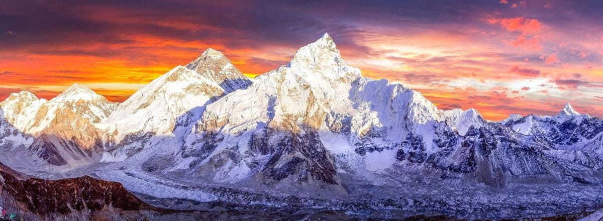 Alt text: Vibrant Nepal: Majestic Himalayas, prayer flags, bustling streets, traditional architecture at sunrise.