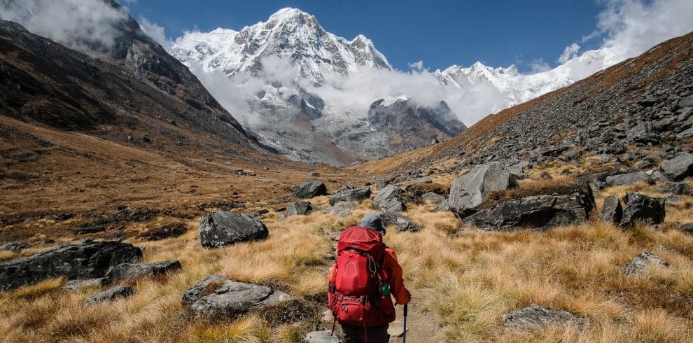 a trekker trekking around beautiful annapurna base camp